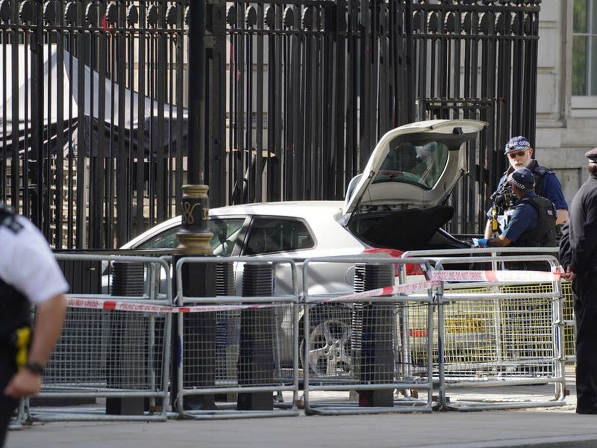 Man arrested after car crashes into gates of Downing Street