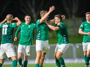 Will Fazakerley, centre, celebrates his goal that put Guernsey FC 2-1 ahead against Chipstead last night at Footes Lane. (Picture by Luke Le Prevost, 30719646)