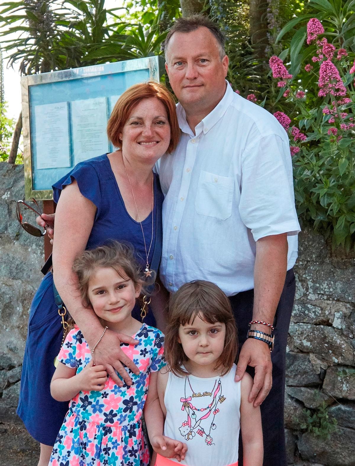 Craig Senior, director of hospitality for Herm Island, with his family – partner Emma Ellis and daughters Megan, 6, left, and Grace, 4. (22659259)