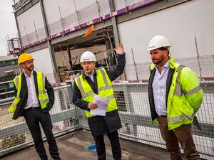 Picture by Sophie Rabey.  19-09-23.  Rihoy & Son celebrate with 'topping out' ceremony at  Admiral Park Plaza House.  The development is six storeys high and 67,000 sq feet..L-R Steve Moores (Surveying Director), Gavin Rihoy (Chairman) and Dan Taylor (Managing Director). (32544536)