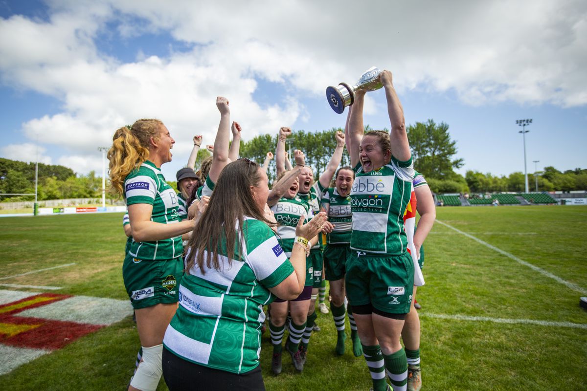 After suffering defeat in Jersey the previous weekend, Raiders Ladies captain Justeen Melbourne was holding the Women’s Siam Cup aloft again. (30846197)