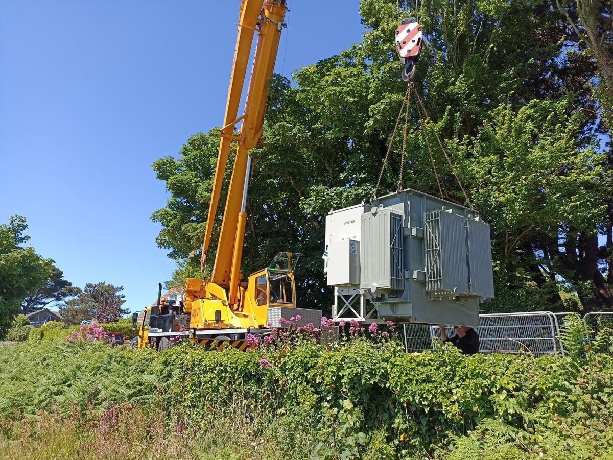 Guernsey Electricity supplied this picture of the new substation being lifted into place at L’Abbaye.