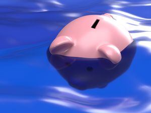 Piggy bank drowning in water. Global recession bankruptcy 3D render concept. Financial and economy crises. Rising inflation. Piggy bank sinking in debt - savings to risk background with copy space (31832989)