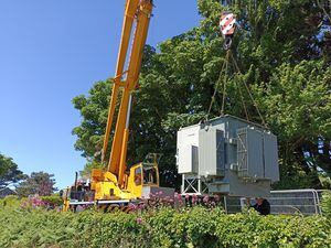 Guernsey Electricity supplied this picture of the new substation being lifted into place at L’Abbaye.