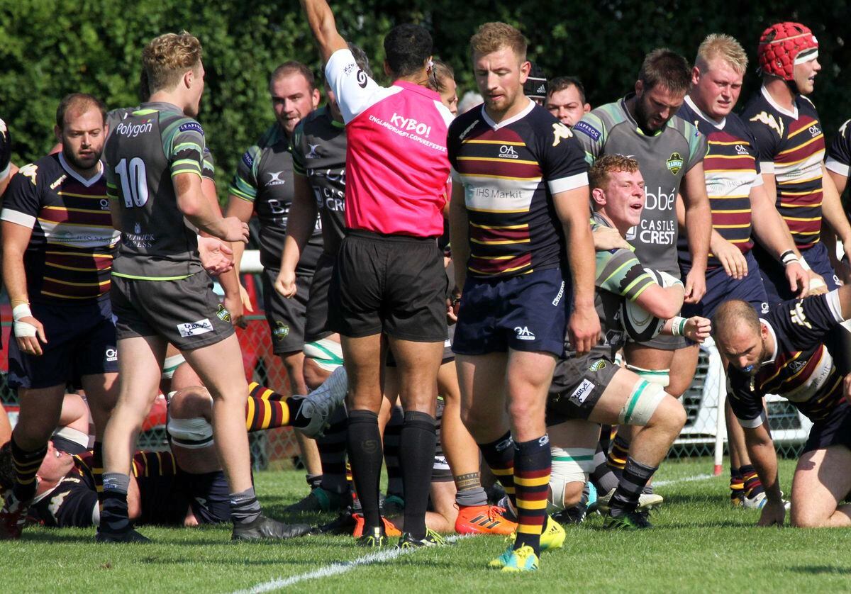 Historic moment: Dom Rice emerges with the ball after scoring Guernsey's first try in National Two South at Old Albanian on Saturday.  (Picture by Mike Marshall, 22421872)