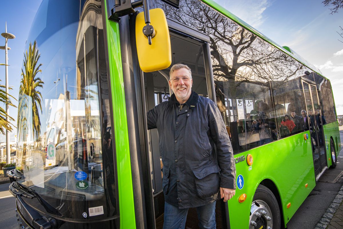 Environment & Infrastructure member Deputy Adrian Gabriel with the Yutong E9 zero-emission electric bus being trialled in the island. (Picture by Sophie Rabey, 31703760)