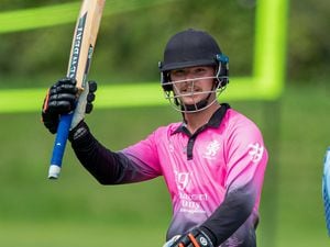 Matt Philp raises his bat on reaching a half-century for Griffins in their crucial win over Walkovers. (Picture by Martin Gray, www.guernseysportphotography.com, 32440354)