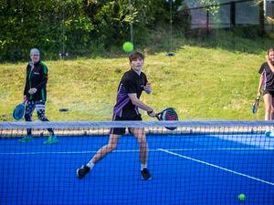 Picture by Luke Le Prevost. 10-05-23..There's been worries that if the Sports Comission loses funding, sports like padel will no longer be available. St Sampsons high school students had an enjoyable time attending a padel session at the Tennis Club. Mason Prigent (15) hits the ball. (32102359)