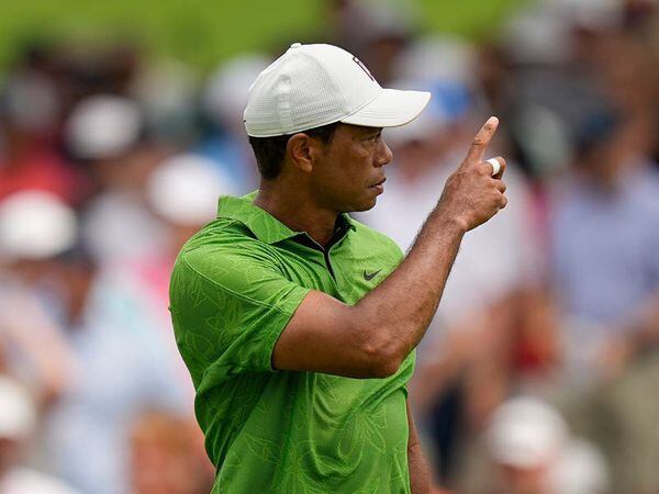 Tiger Woods survives halfway cut to keep US PGA hopes alive