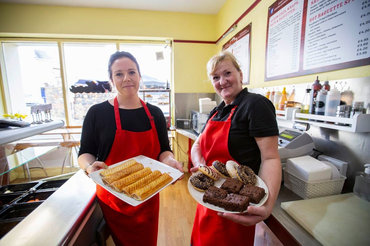 Layla-Marie Bruce, left, and Jelena Borkorsko of Fillers Sandwich Bar in Smith Street, one of several food outlets and coffee shops welcoming workers back into Town now that the CCA’s work from home guidance has been lifted. (Picture by Luke Le Prevost, 30416992)
