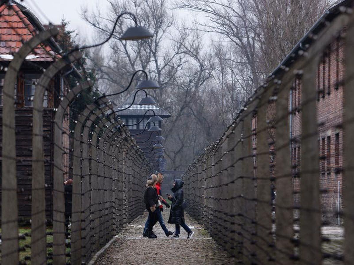 Auschwitz anniversary marked as peace in Europe again shattered by war
