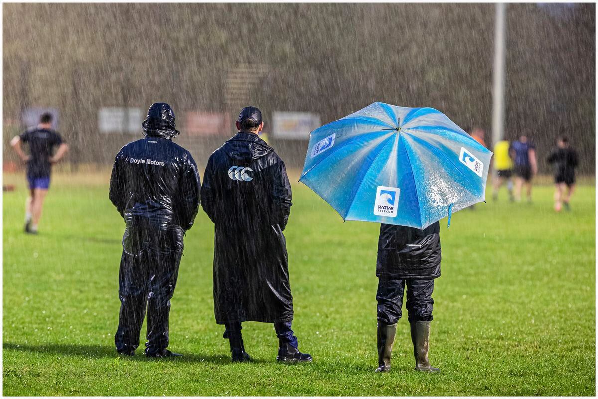 The Guernsey Raiders coaches oversee training in the pouring rain at Footes Lane ahead of the first home game of the season.Picture by Martin Gray, 28-09-21 (30040578)