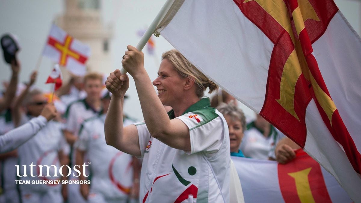 Shooter Nikki Trebert carried Guernsey's flag at the last Island Games opening ceremony in Gibraltar four years ago. (Picture by Peter Frankland)