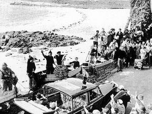 Much has changed since 1957, when islanders put on a fishing-themed display at Cobo for the Queen's visit. (30311050)