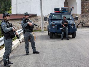 Nato beefs up Kosovo presence with UK troops after monastery shootout