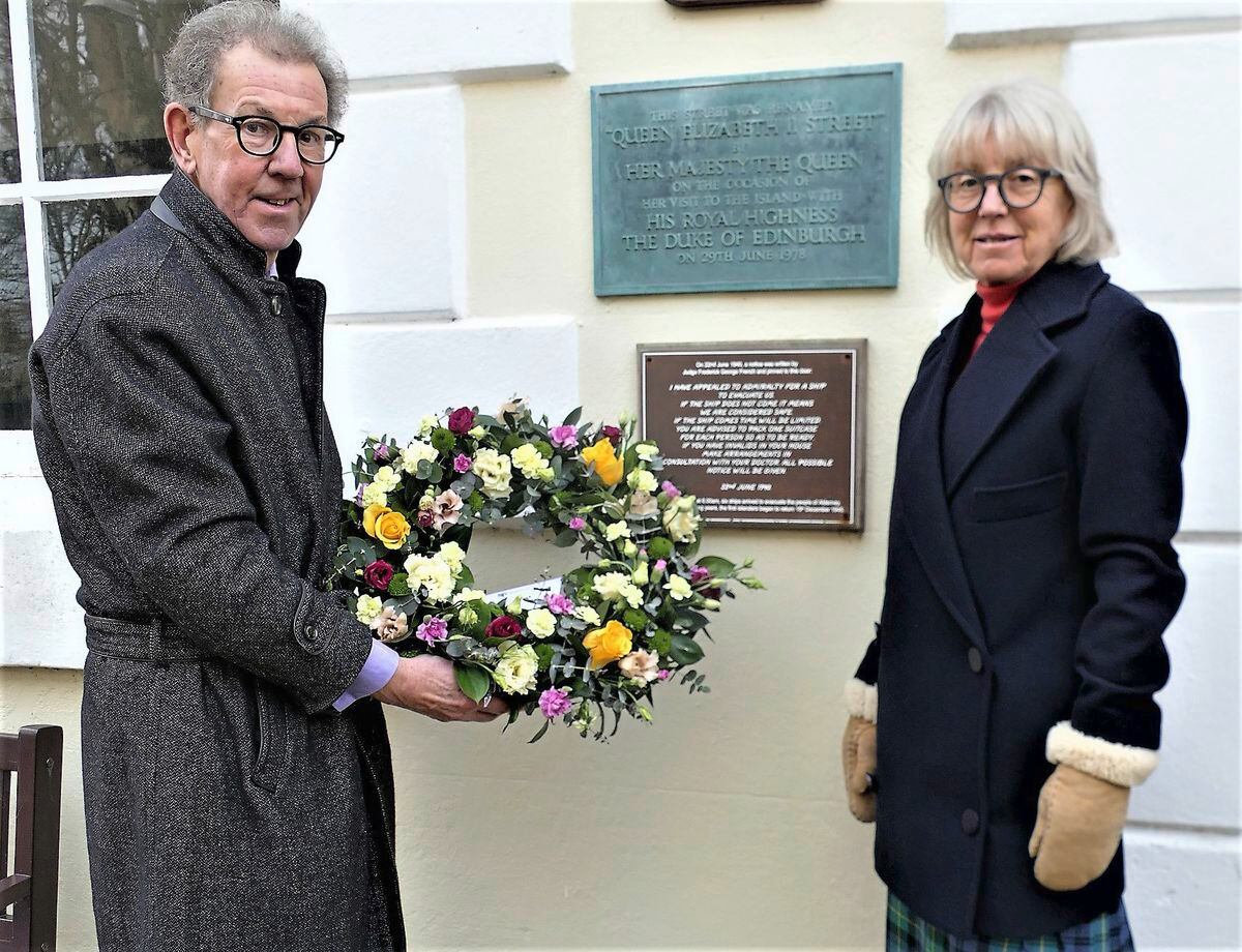 States of Alderney President William Tate laid a wreath under the plaque containing the words of the plea for the island to be evacuated in 1940. He was accompanied by his wife, Gabrielle. (Picture by David Nash)