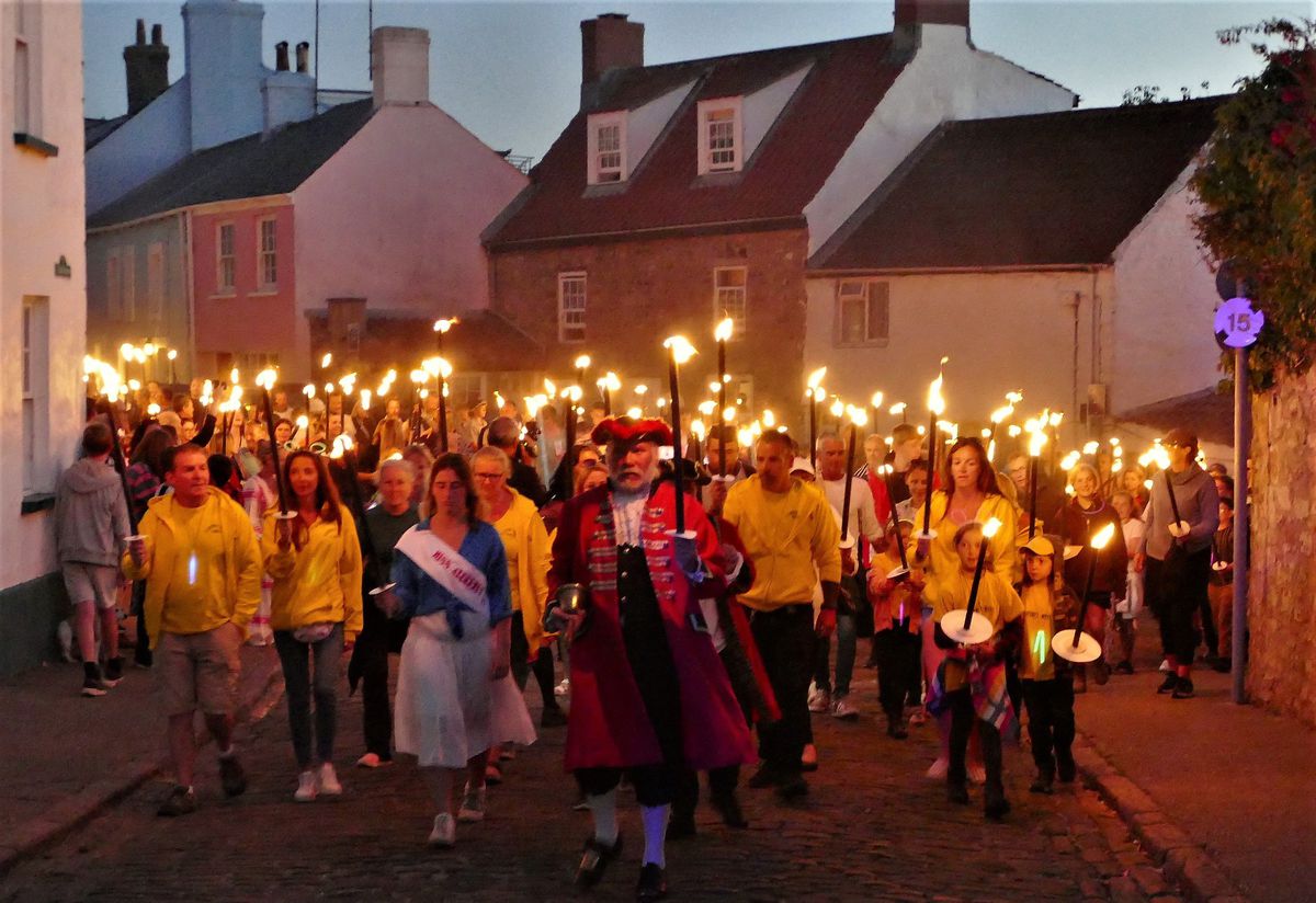 Alderney Week ended with the traditional torchlight procession. (Picture by David Nash)