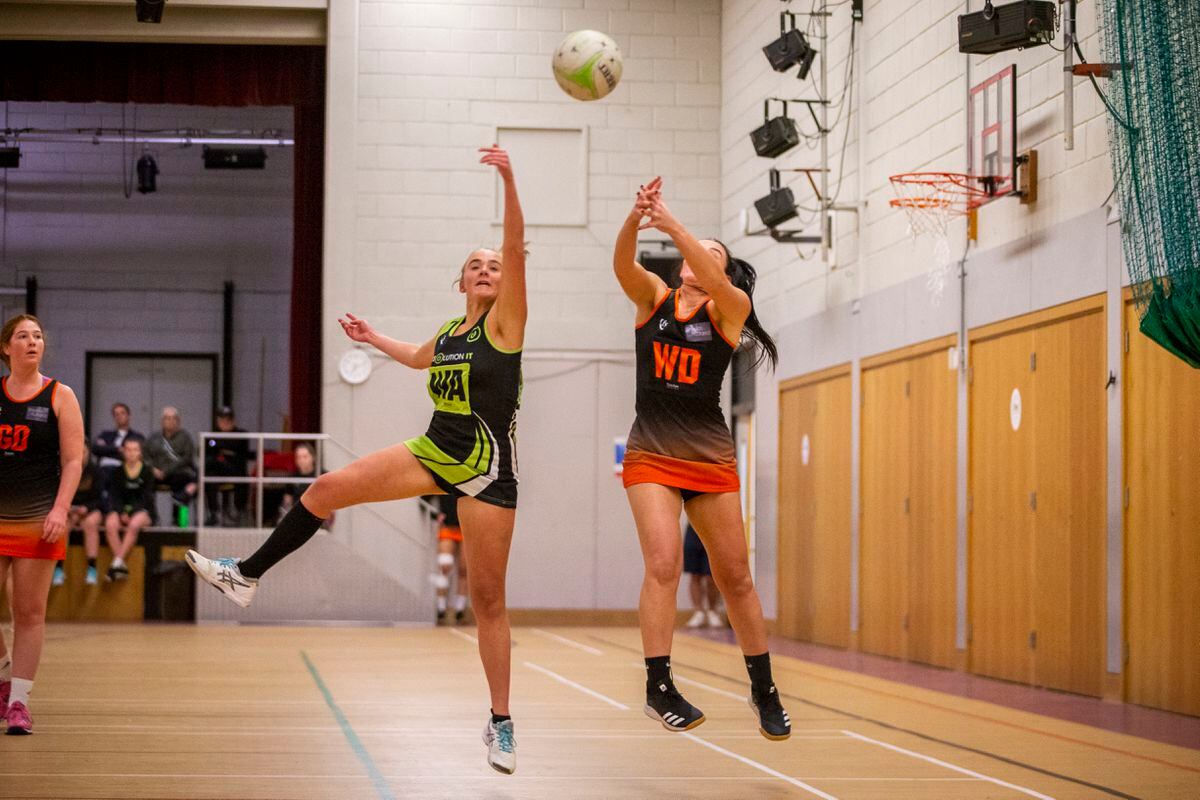 Harriet Savident, left, and Hannah Blondel go up for the ball. (Picture by Luke Le Prevost, 31499736)