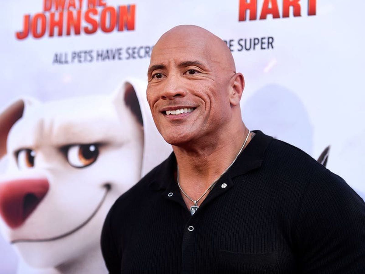 Dwayne Johnson surprises family of fans with new puppy at Super-Pets screening