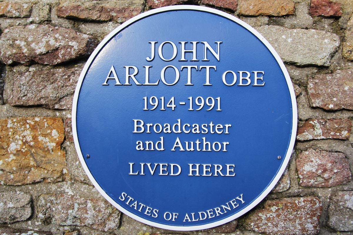 The blue plaque outside the former home of John Arlott which commemorates his link with the island.