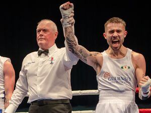 Scott Little celebrates as he has his arm raised in victory over Corey Rivers on Saturday night at Beau Sejour. (Picture by Andrew Le Poidevin, 31421543)