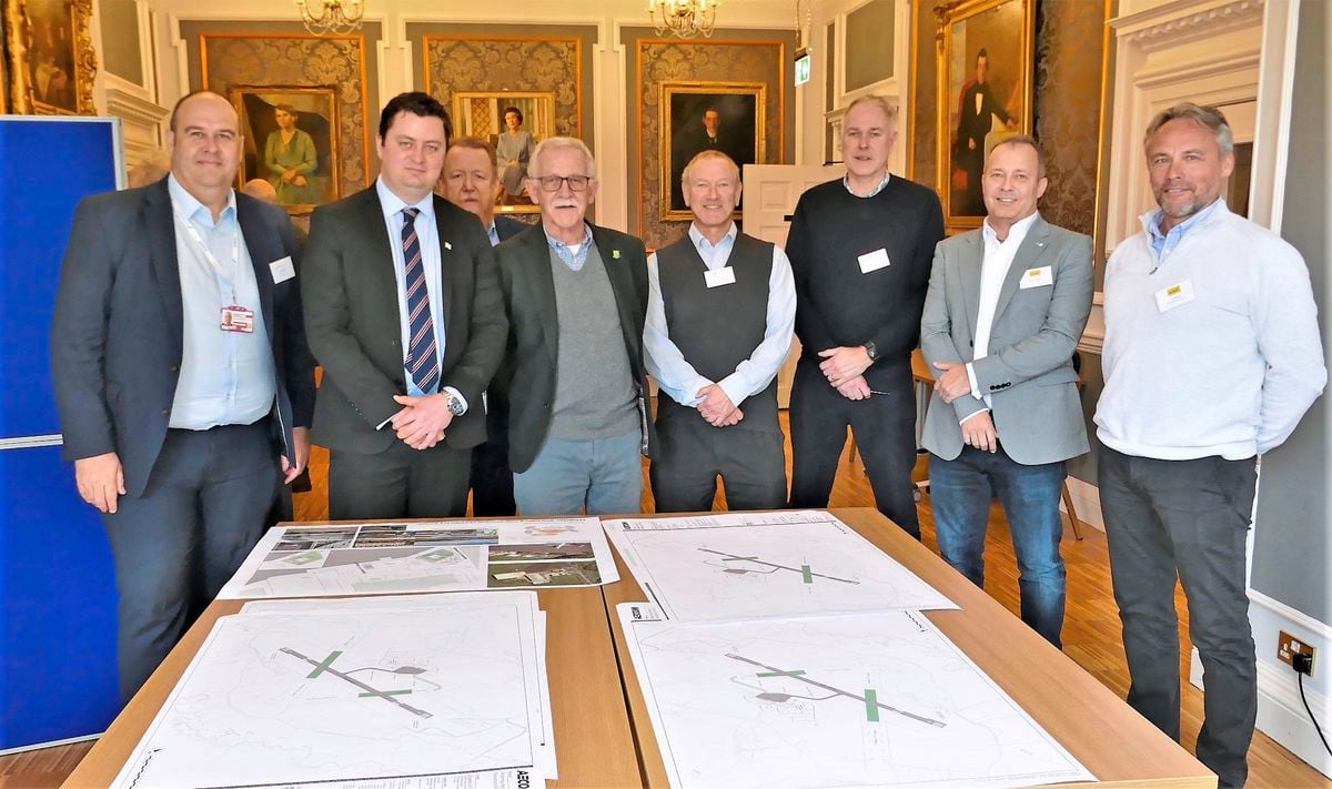 Pictured at the drop-in for the runway plans. From left: Ross Coppolo (Guernsey Ports), States member Alex Snowdon, Jim Anderson (Guernsey Ports), Policy & Finance chairman Bill Abel, Alderney economic planning officer Paul Veron, Colin Le Ray (Guernsey Ports) and Nico Bezuidenhout and Carl Phelan from Aurigny.  (Pictures by David Nash) 
