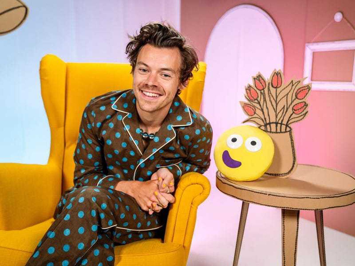 Harry Styles wears spotted pyjamas to read his CBeebies Bedtime Story