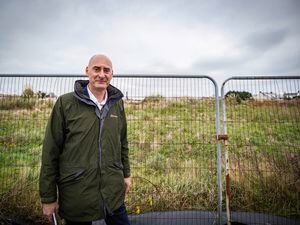 Steve Williams, chief executive of the Guernsey Housing Association on the former Kenilworth Vinery site, one of two where it plans to get spades in the ground this year. (Picture by Sophie Rabey, 30302362)