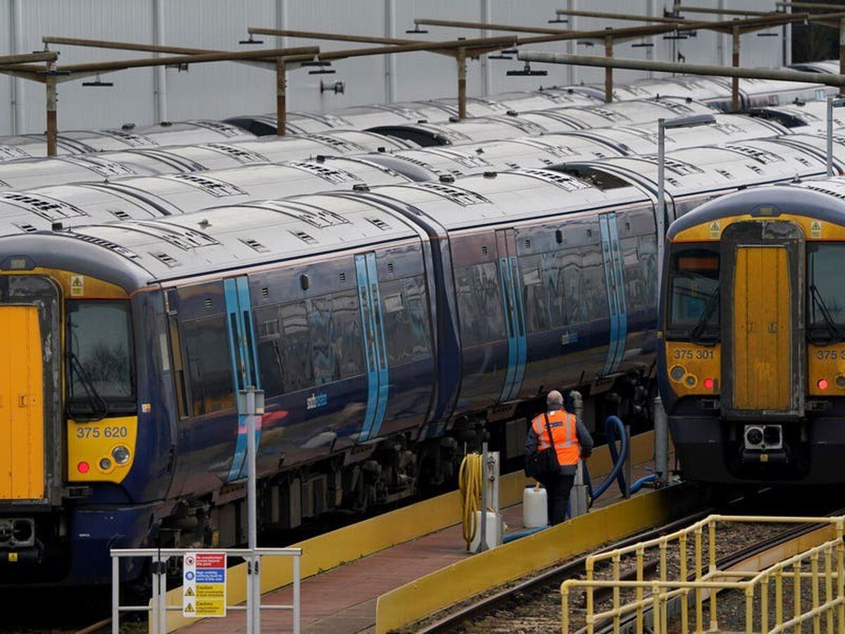 Train passengers face disruption as rail workers strike in pay and jobs row