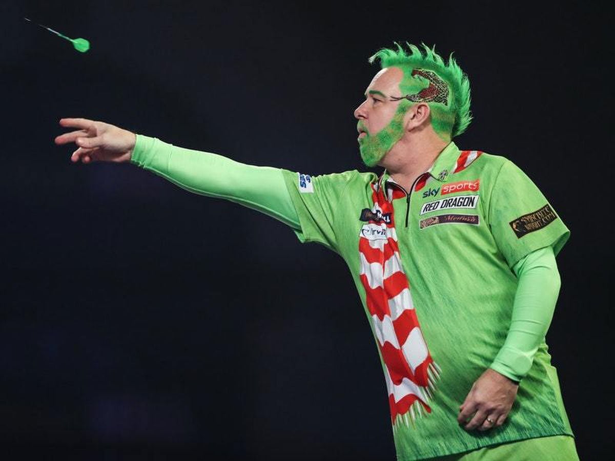 The Grinch does not flinch: Peter Wright makes winning ...