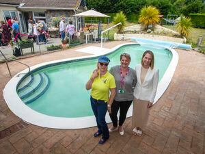 Teena Gordon, centre, administration officer for the States Adult Disability Service, was the driving force behind getting the pool at Chateau Reve reopened. She was supported by the third sector and private businesses, including Only Fools and Donkeys, whose Linda Armstead is on the left, and Ravenscroft, represented by Sophie Yabsley. (Picture by Peter Frankland, 30991197)