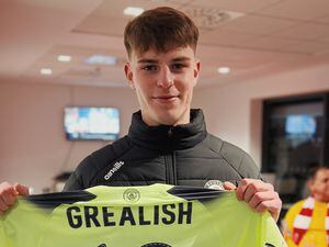 Scott, who has been nicknamed the 'Guernsey Grealish', with his hero's shirt after Tuesday's FA Cup tie between Bristol City and Man City. (Picture by Tony Curr)