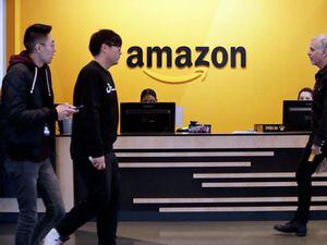 US Amazon workers upset over job cuts stage walkout at HQ