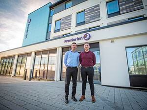 The first guests will be welcomed into the Premier Inn at Admiral Park from Wednesday. Pictured outside are hotel manager Joshua Davies, left, and Matthew Case, regional operations manager for the Channel Islands. (Picture by Sophie Rabey, 30528756)