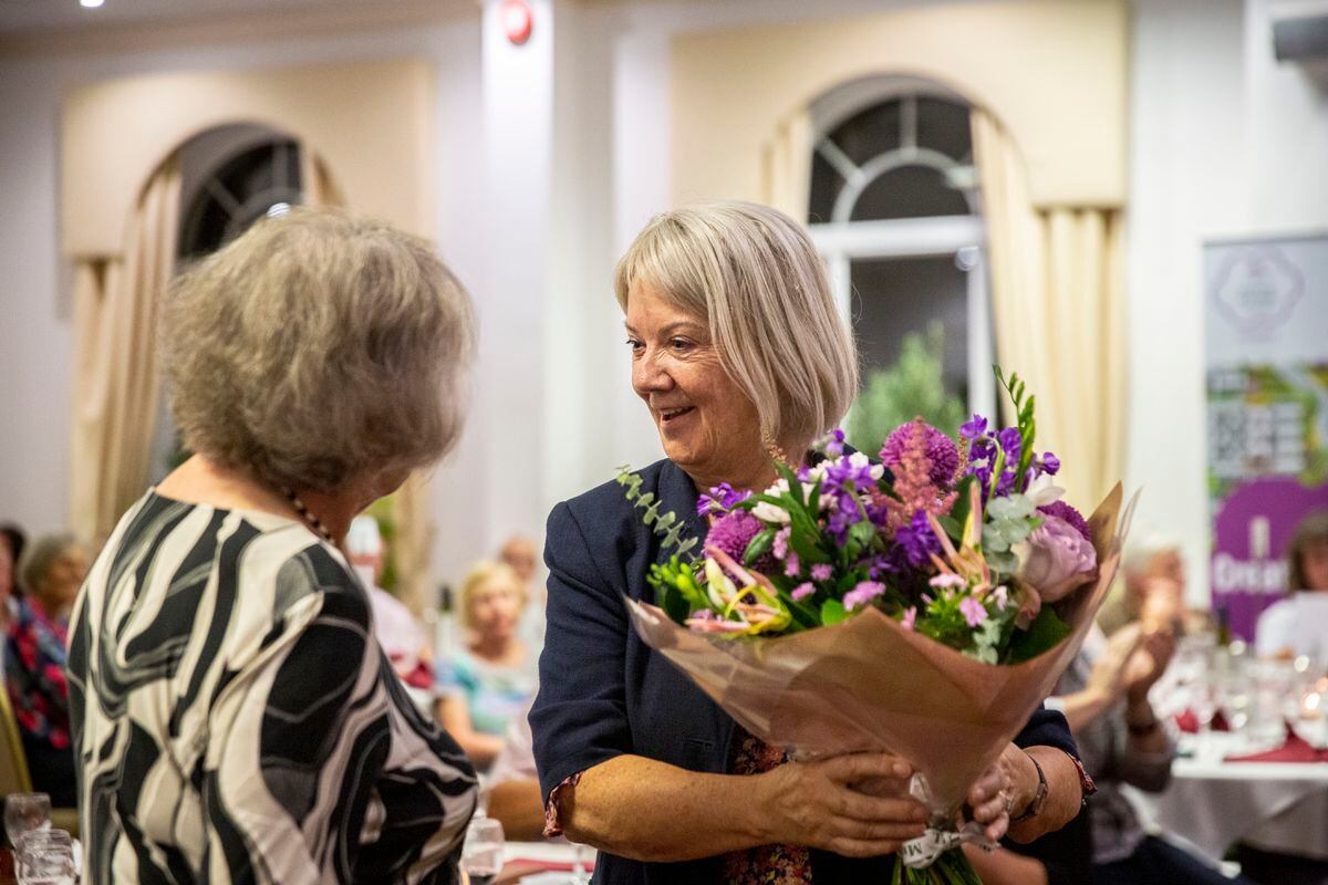 Picture by Luke Le Prevost. 15-09-22..Floral Guernsey Community Awards at Les Cotils. Dame Mary Perkins presented with a bouquet of flowers. (32124137)