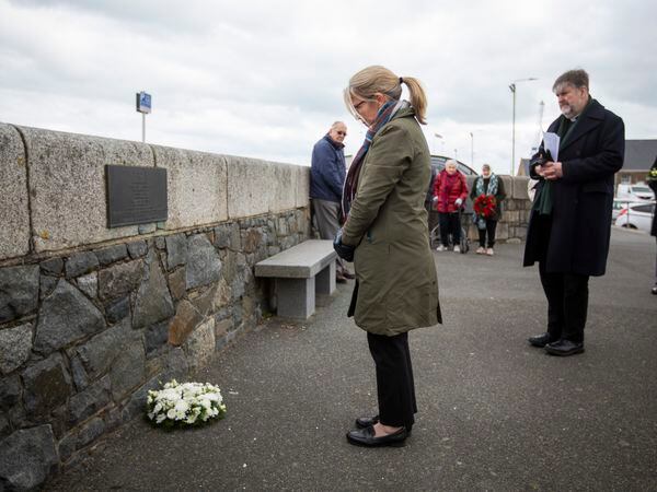 Deputy Bailiff Jessica Roland lays a wreath at the plaque dedicated to the three Jewish women who were living in Guernsey and who were sent to their deaths in Auschwitz. (Pictures by Luke Le Prevost, 31744845)