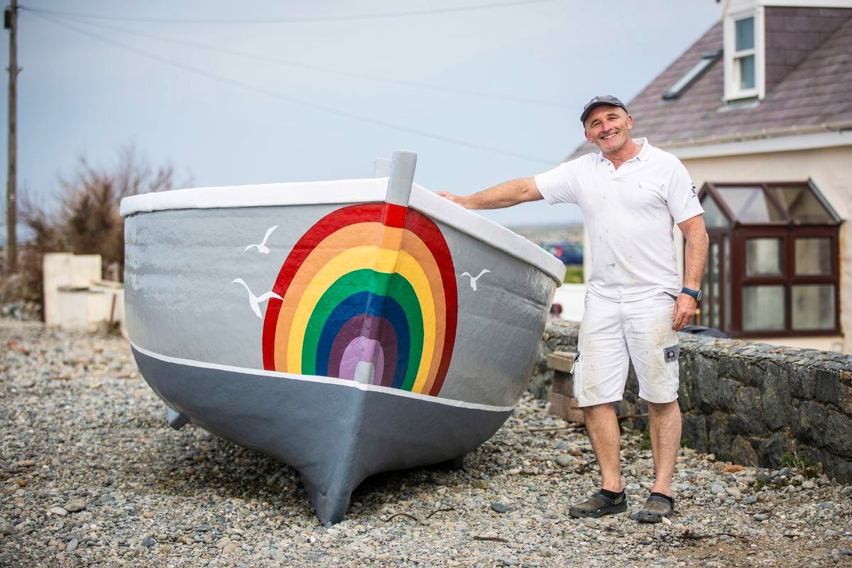Decorator Chris Bran and his rainbow boat. (Pictures by Sophie Rabey, 27917922)