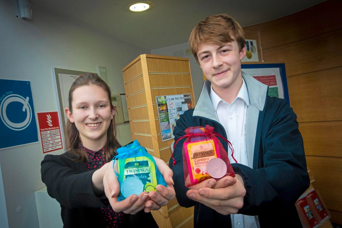Grammar school students Grace Bennalick and Billy Nicholson with their Young Enterprise products aimed at improving people's mental health. Their company is called Touch of Kindness. (Picture by Peter Frankland, 30506192)