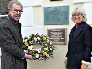 States of Alderney President William Tate laid a wreath under the plaque containing the words of the plea for the island to be evacuated in 1940. He was accompanied by his wife, Gabrielle. (Picture by David Nash)