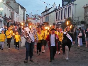 The traditional torchlight procession, follwed by a spectacular bonfire and firework display, brought Alderney Week 2023 to a close over the weekend. (32422761)