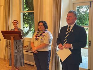 Amy Woodland was presented with her Queen's Scout Award by Lt-Governor Richard Cripwell at the same time as news broke of the Queen's death. On the left is Government House administrative secretary and events coordinator Rachael McCutcheon. (31272796)