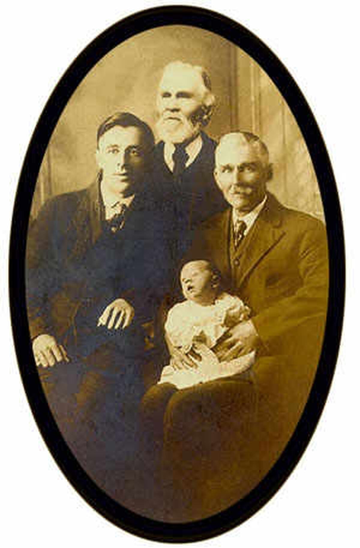 In this four generations photograph is, clockwise from top, Jean Thomas Corbet (1836-1926), his son Alfred John Corbet (1864-1937), on his lap Alfred John Corbet (Christian's grandfather, 1922-1989) and his father Wilfred John Corbet (1893-1971). The photo was put together using two pictures at the suggestion of Guernsey photographer T. A. Grut and was created to celebrate the arrival of Jean Thomas Corbet's first great-grandson.