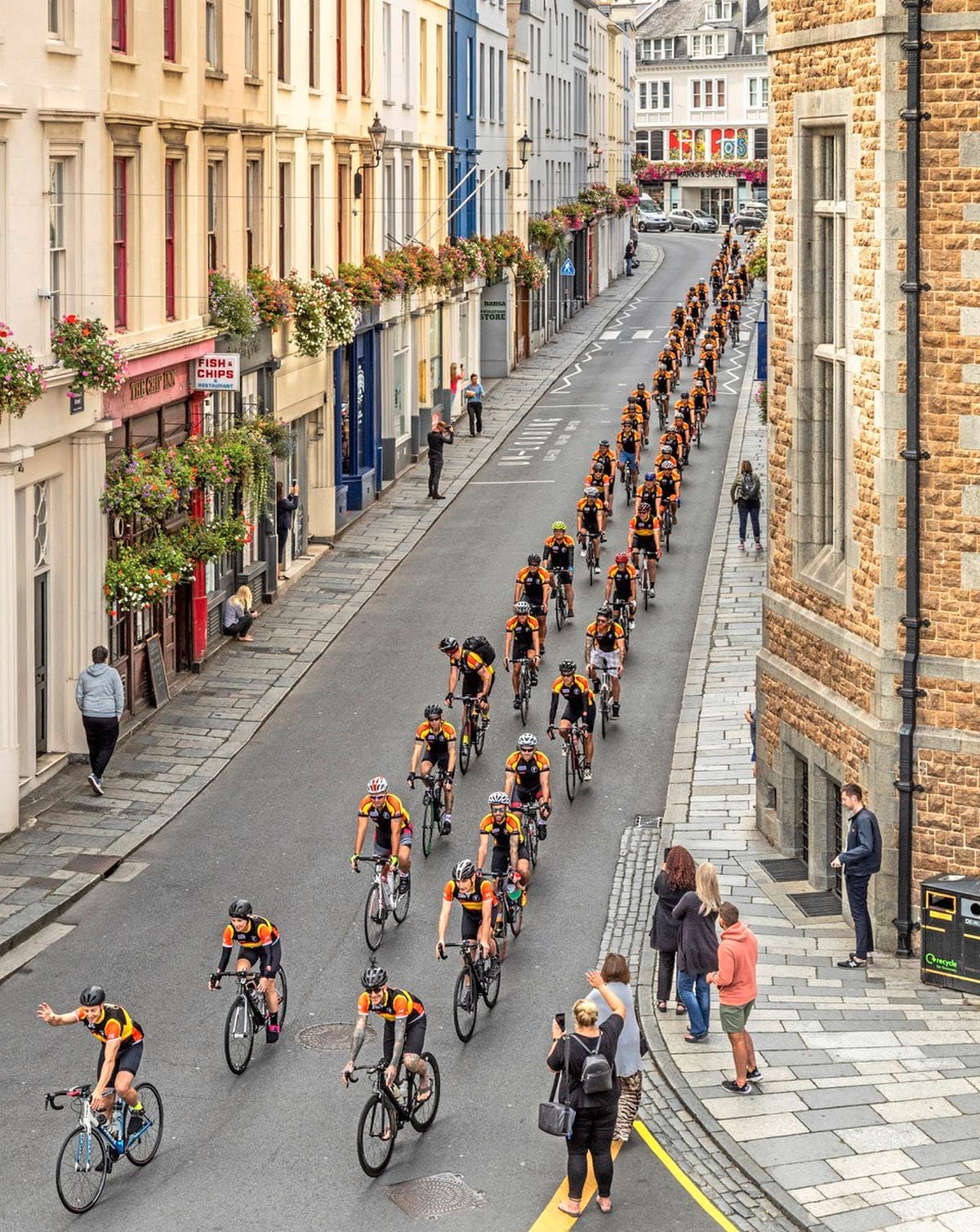 Friday, September 7th 2018, St Peter Port. Start of the Tour De Sez 2018 heading down Fountain Street on the first leg of their journey to catch the Condor Ferry to France. (29407743)