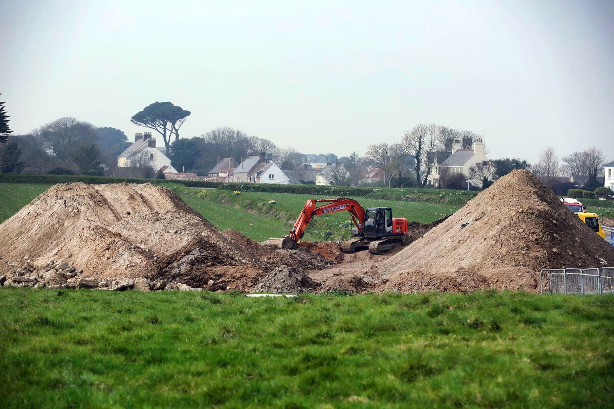 Digging out the PFOS infected earth from the site of the 1999 plane crash on Forest Road. (Picture by Peter Frankland, 31713967)