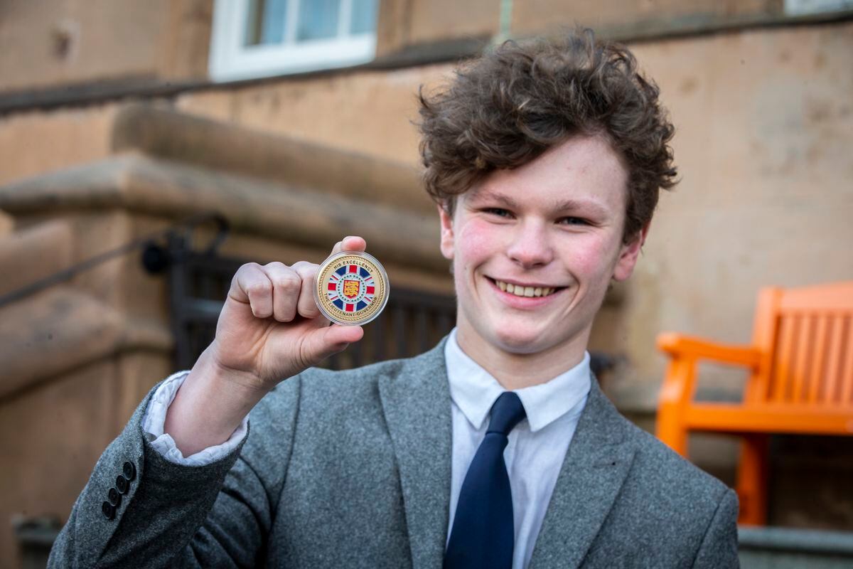 Student William Beasley, 17, correctly identified the Lt Governor’s cufflinks had the flag of the British Ocean Territory on them and was presented with his personal challenge coin, an ancient military tradition. (31685845)