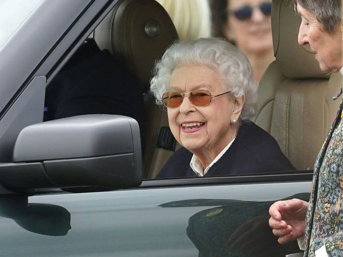 Smiling Queen arrives at Royal Windsor Horse Show