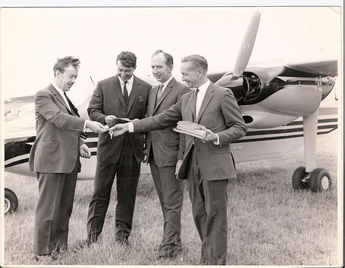 Accepting the keys: Aurigny's predecessor, Glos-Air, taking delivery of its first BN-2 Islander, 13 August 1967. Left to right: John Britten, Desmond Norman, Charles Poole, Bert Lane. (Christine Herring) (31388809)