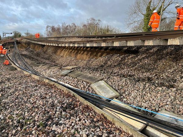 The landslip near Hook has left one track hanging in mid-air and has damaged another. (Picture courtesy of Network Rail)