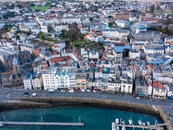 Picture By Peter Frankland. 12-12-22 Generic aerial image of St Peter Port harbour. Plans are in place to develop the pool area into an all-tide marina..St Peter Port seafront. Drone. (31884840)