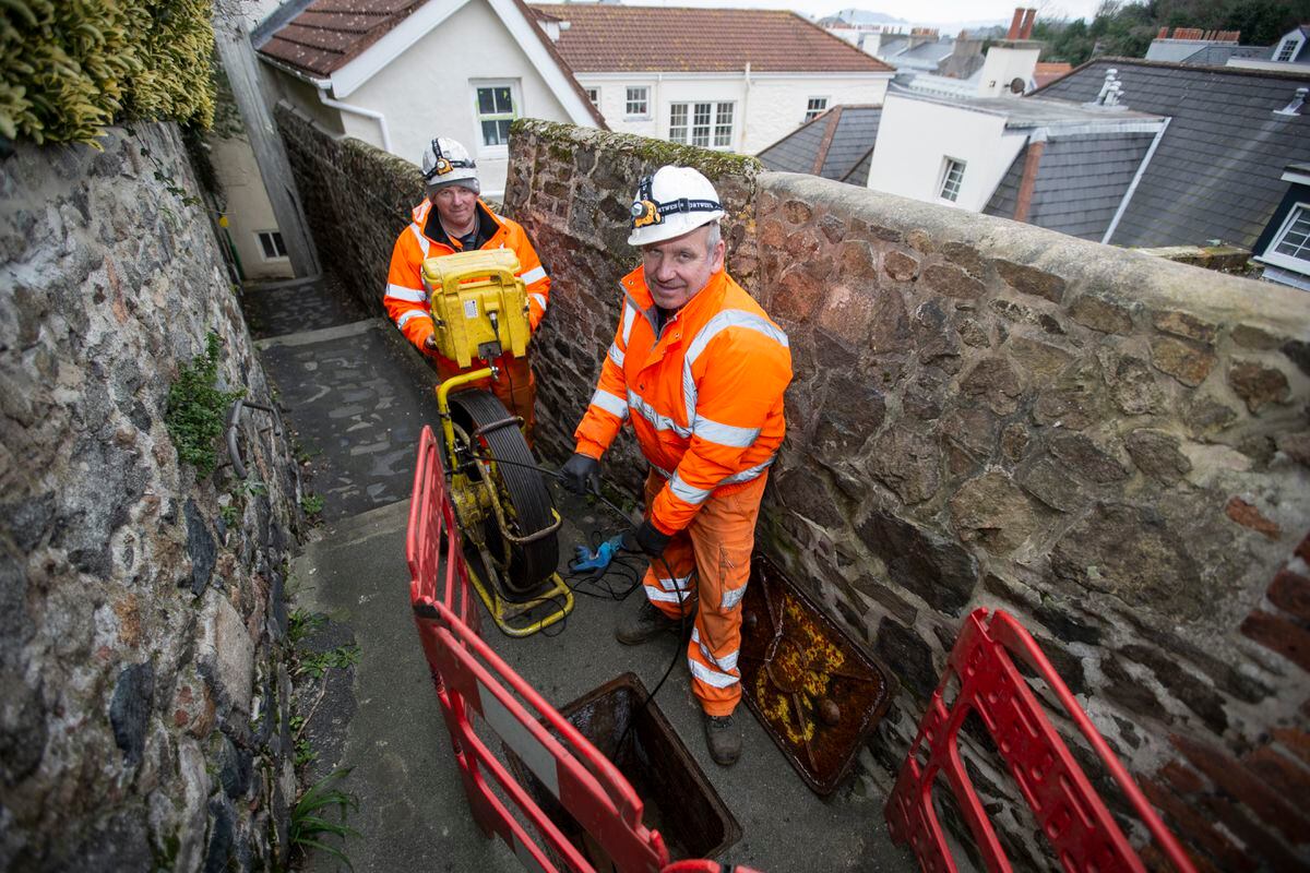 Guernsey Water is using CCTV cameras to thoroughly survey water drains in the Clifton area where their vans are not accessible. Pipeline engineers David Benton, left, and Paul Matulevicius at work. (Picture by Luke Le Prevost, 31726996)